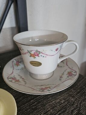 Vintage White Floral Porcelain Teacup and Saucer